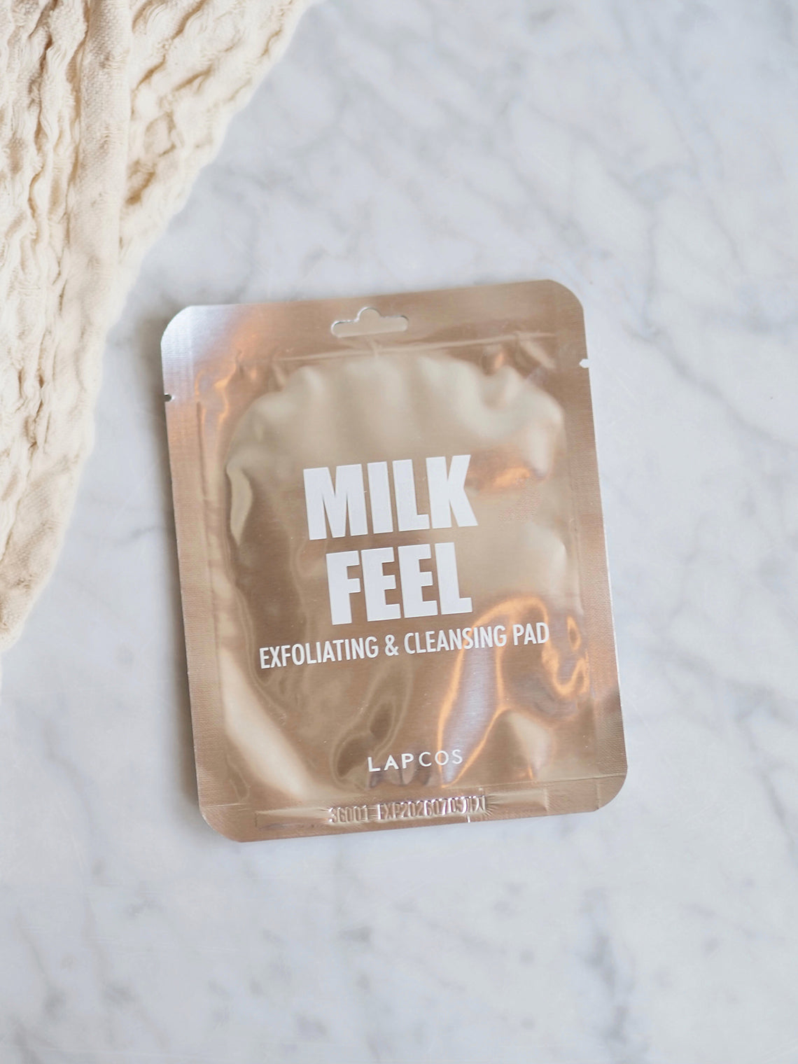 Milk Feel Exfoliating & Cleansing Pad - The Cross Decor & Design