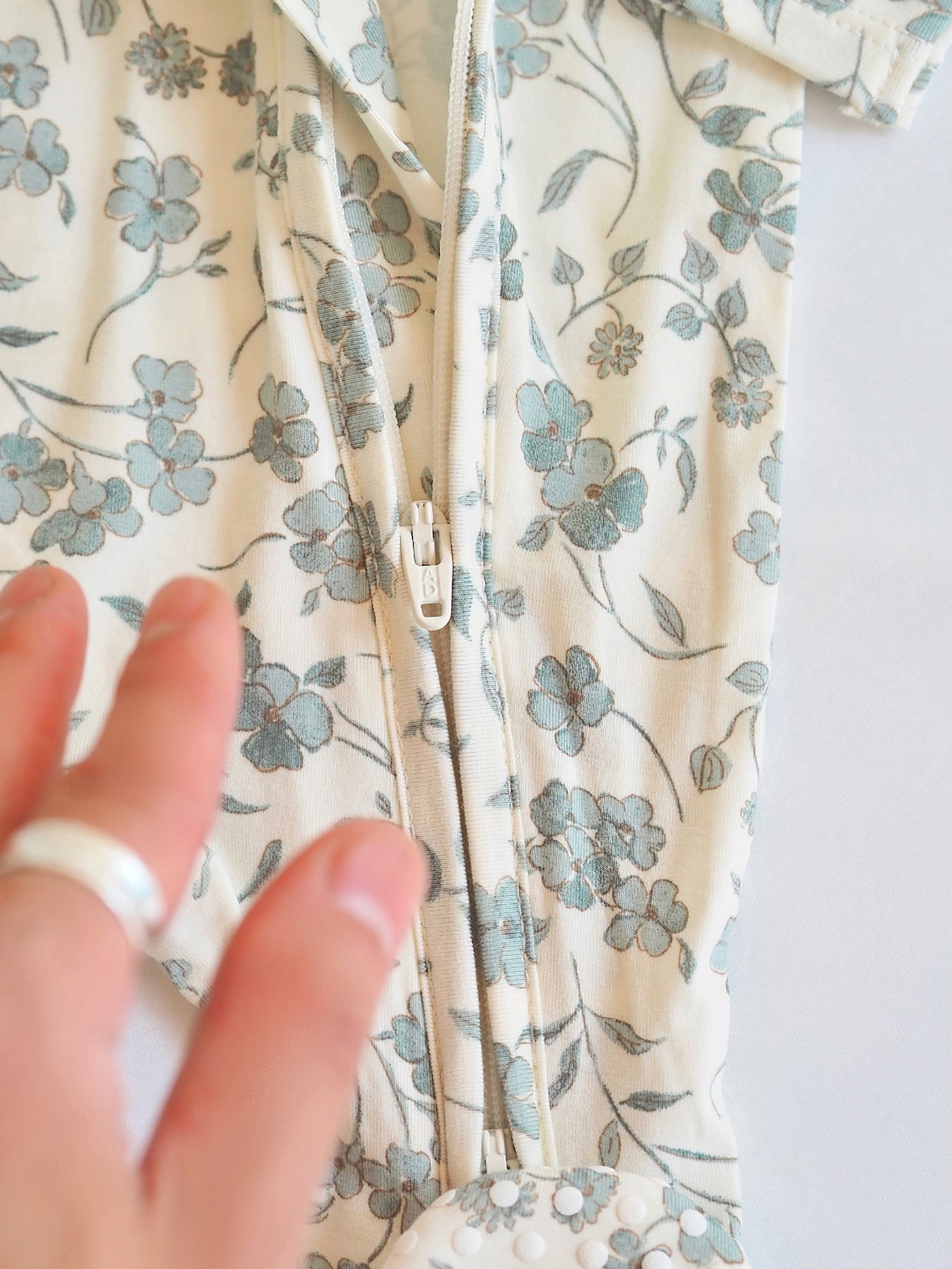 Baby's Breath Floral Zipper Footie - The Cross Decor & Design