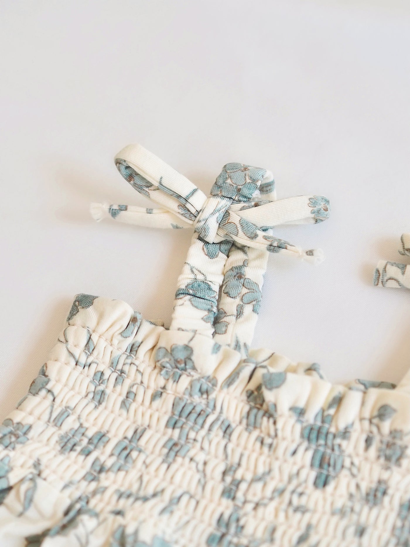 Baby's Breath Floral Tie Strap Smocked Bubble - The Cross Decor & Design